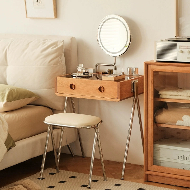 Elegant cherry wood makeup vanity with iron legs showcasing the natural wood grain.