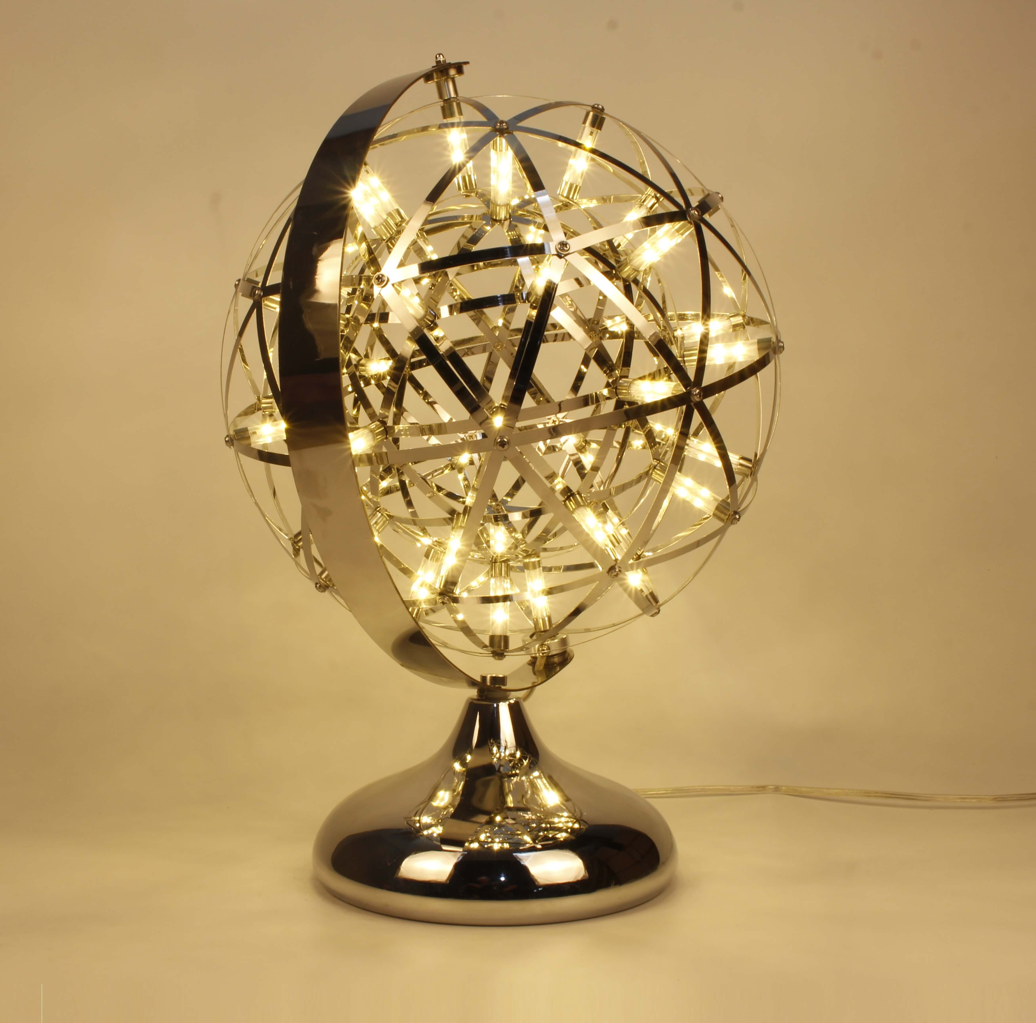 Artistic Rotatable Globe LED Table Lamp viewed from the front, showcasing its elegant design.