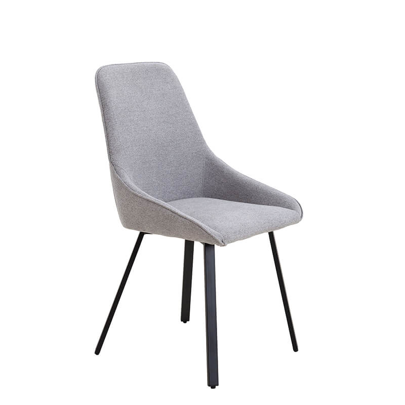 Gray adjustable upholstered dining chair from a side angle, showcasing its ergonomic design.