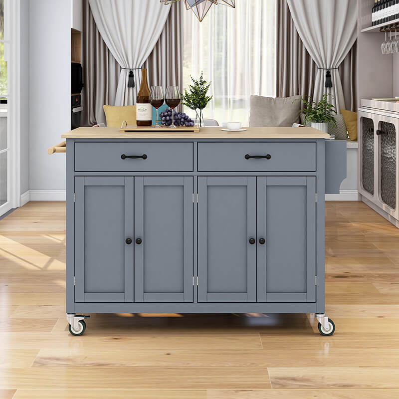 Side view of the grey blue wood kitchen island cart featuring four-door cabinet and locking wheels.
