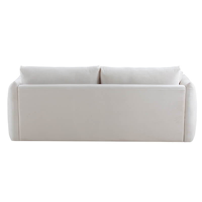 Detail of the ergonomic cushion design on the beige sectional sofa, showcasing its plush comfort.
