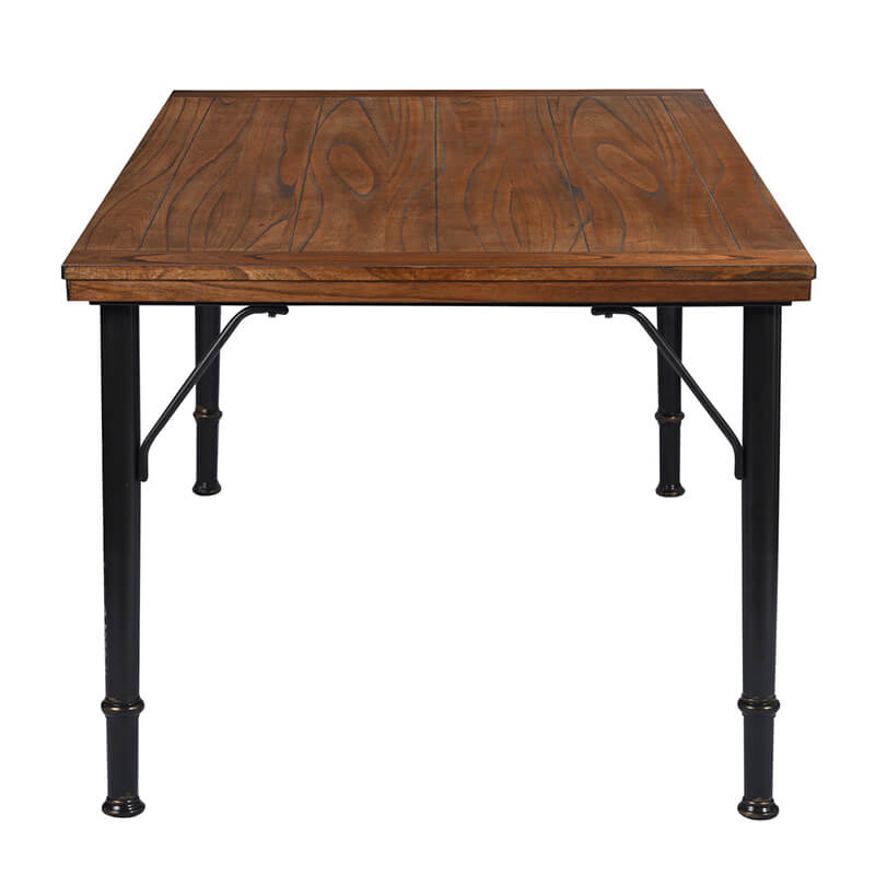 Dining setup featuring the rustic dining table with six chairs, ideal for gatherings.