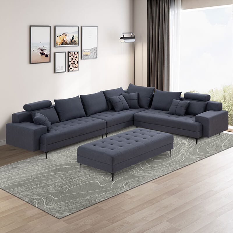 Side view of the dark grey sectional sofa showcasing its spacious design and plush cushions.