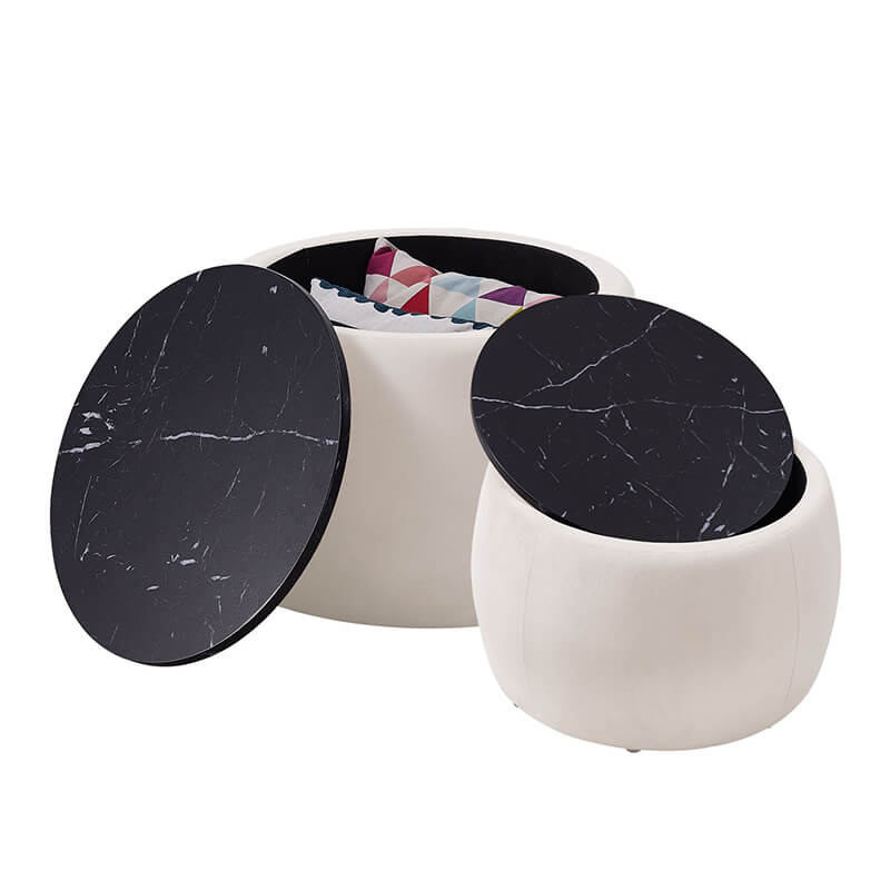 Nesting round storage ottoman in use as a stylish coffee table in a modern living room.