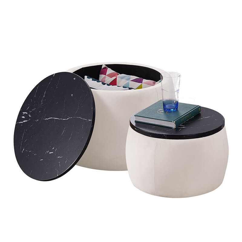 Nesting round storage ottoman in use as a stylish coffee table in a modern living room.
