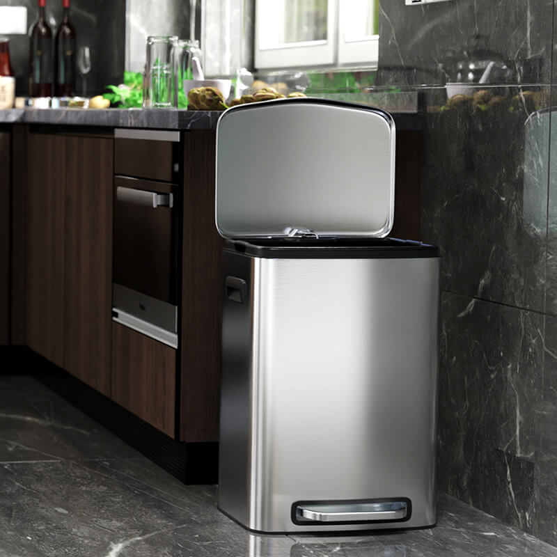 Elegant 13 Gallon stainless steel trash can with foot pedal from a side angle.