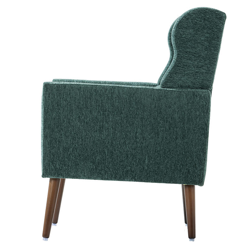 Cozy setup with the green upholstered chair in a stylish living room setting.