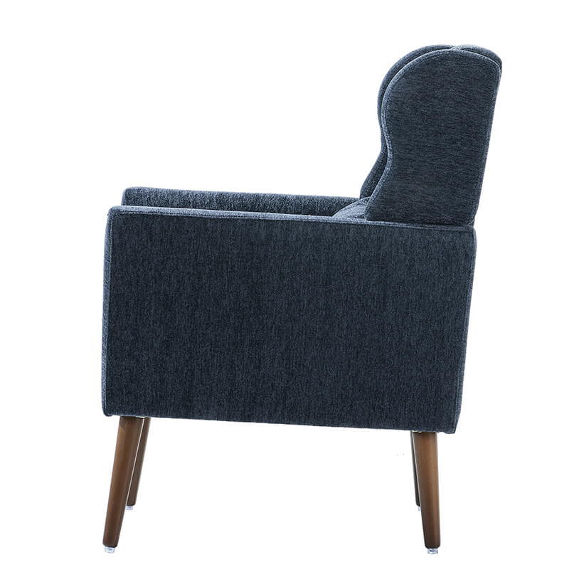Close-up of tufted armchair showcasing the quality chenille fabric.