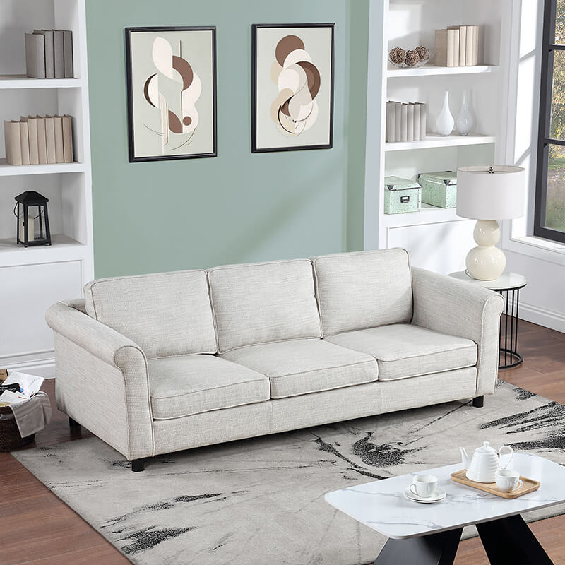 Bishop Beige 3-seater upholstered fabric sofa with round armrests and plush velvet finish.