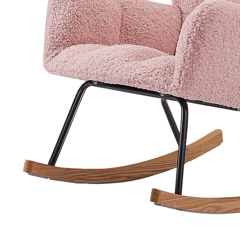 Full view of the pink boucle rocking chair in a stylish living room, demonstrating its versatility as a comfortable chair for adults.