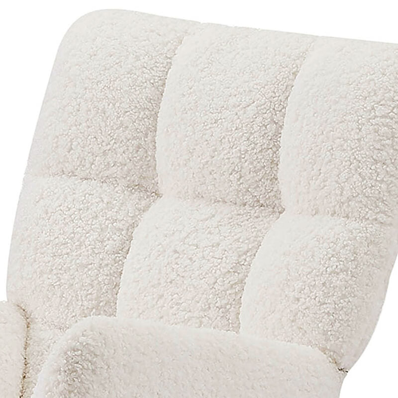 The glider chair in a cozy corner, perfect for reading to your baby.