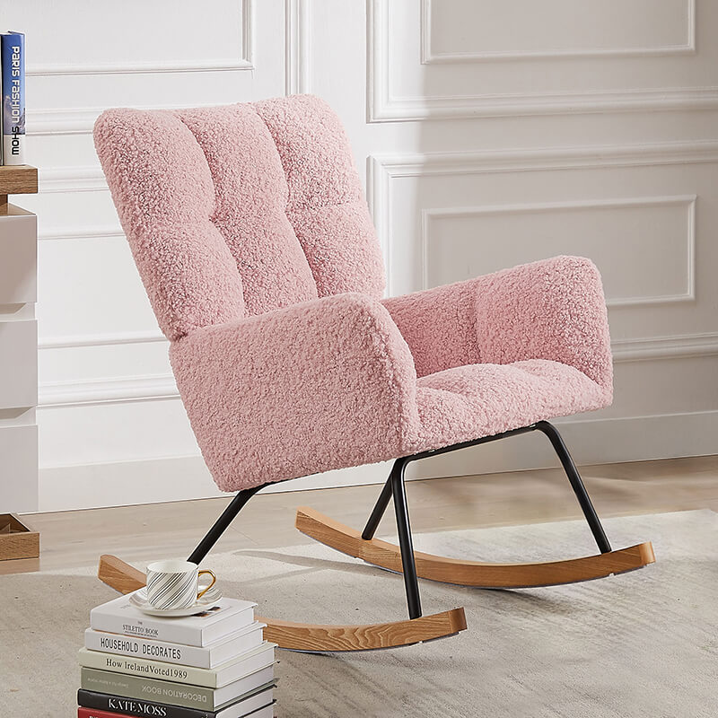 Side view of the rocking chair in a cozy nursery setting, emphasizing its armrests and overall comfort.