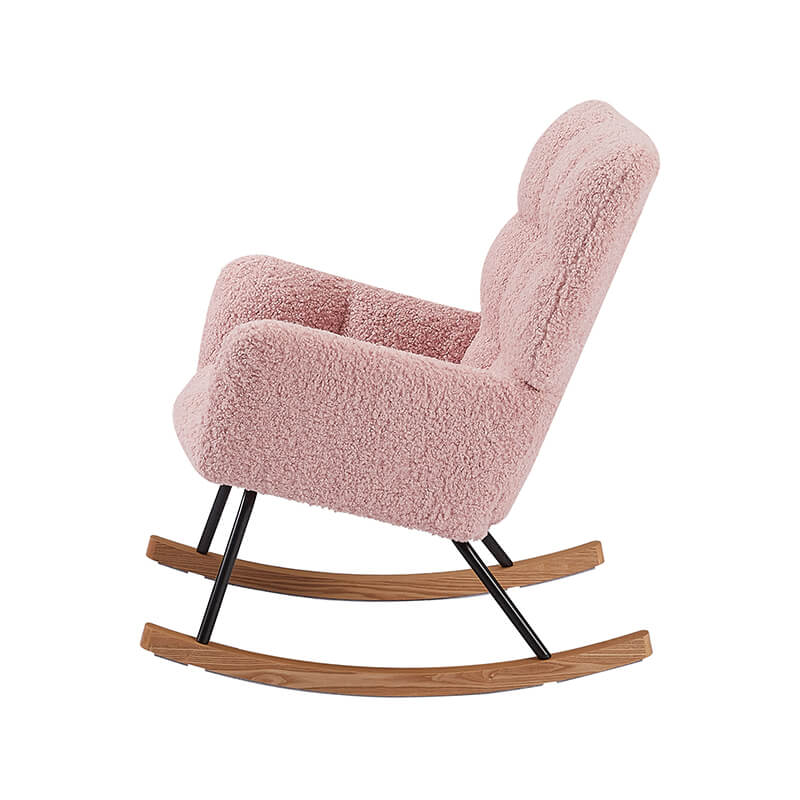 Full view of the pink boucle rocking chair in a stylish living room, demonstrating its versatility as a comfortable chair for adults.