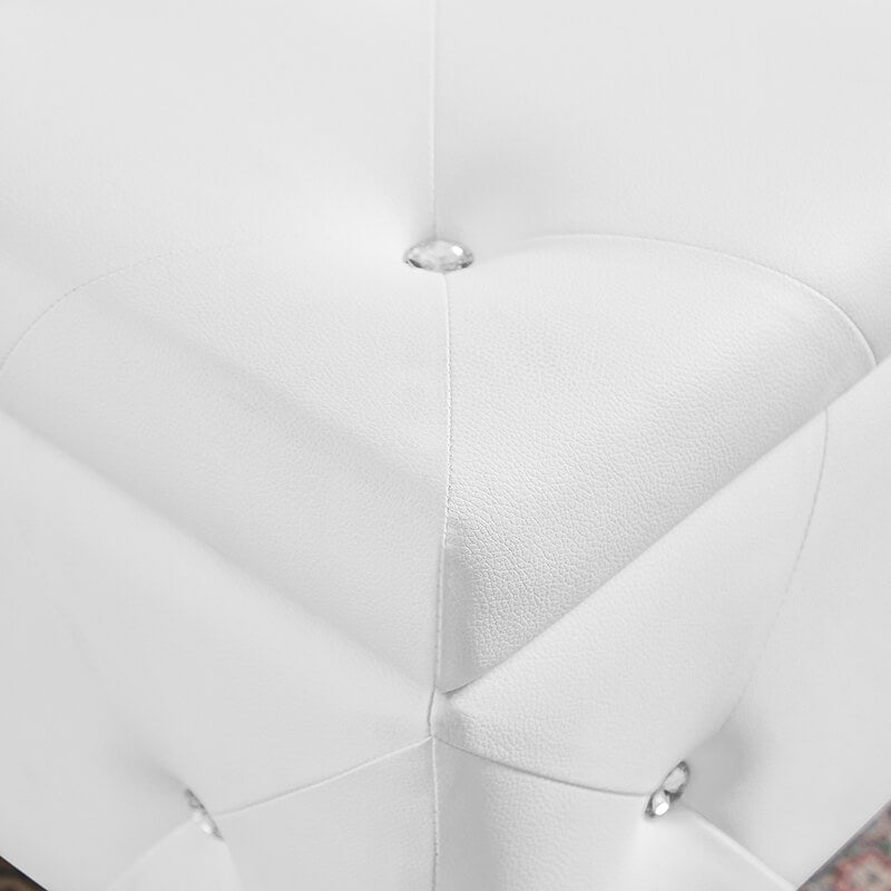 Elegant white leather storage ottoman bench from a side angle, showcasing its stylish design and fabric texture.
