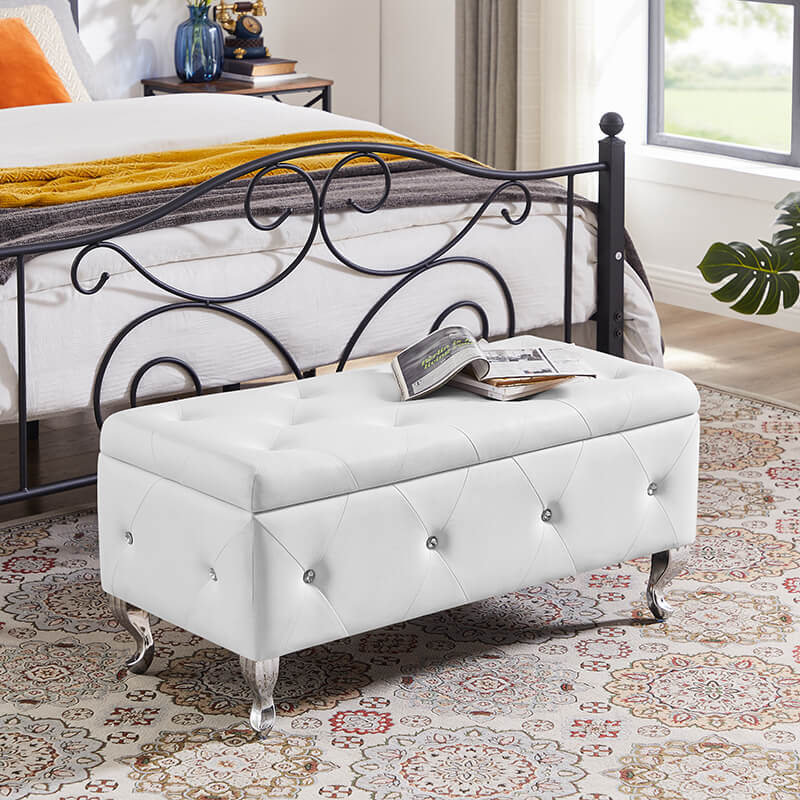 Elegant white leather storage ottoman bench from a side angle, showcasing its stylish design and fabric texture.