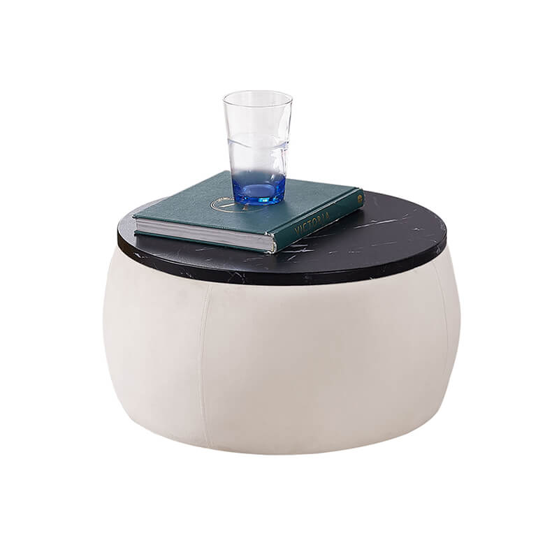 Spacious interior of the round storage ottoman perfect for storing blankets and magazines.