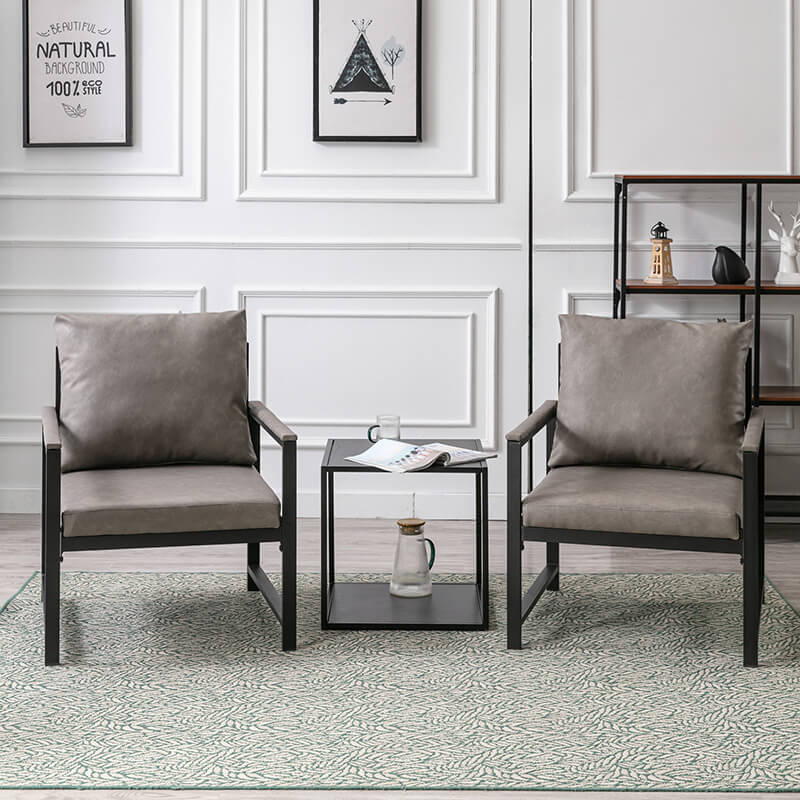 Lifestyle shot of the modern gray PU leather accent chair in a stylish living room setting.