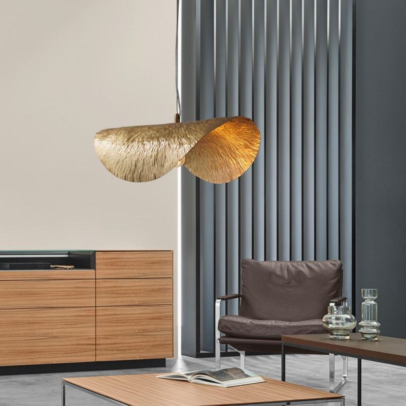 Stylish copper light hanging in a cozy living room, adding warmth and elegance to the decor.