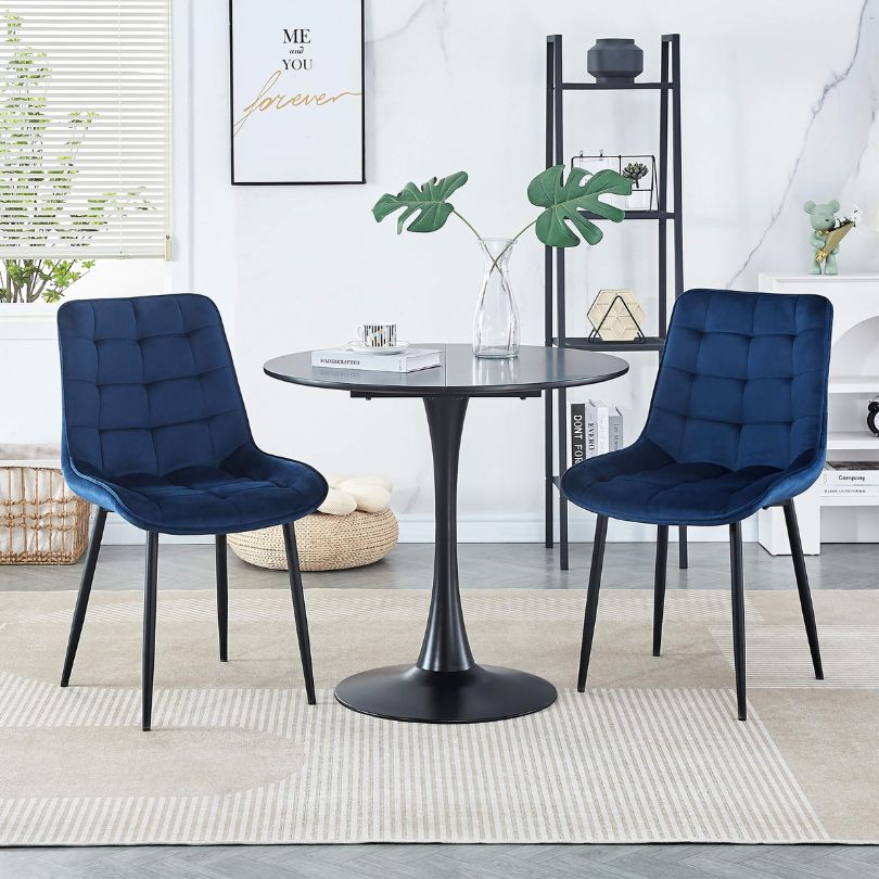 High back modern dining chairs with sleek black powder steel legs, enhancing contemporary decor.