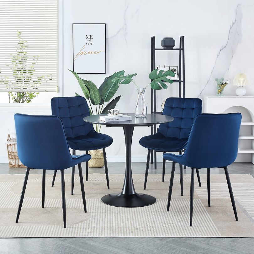 Elegant blue velvet dining chair set showcasing ergonomic design and plush comfort.