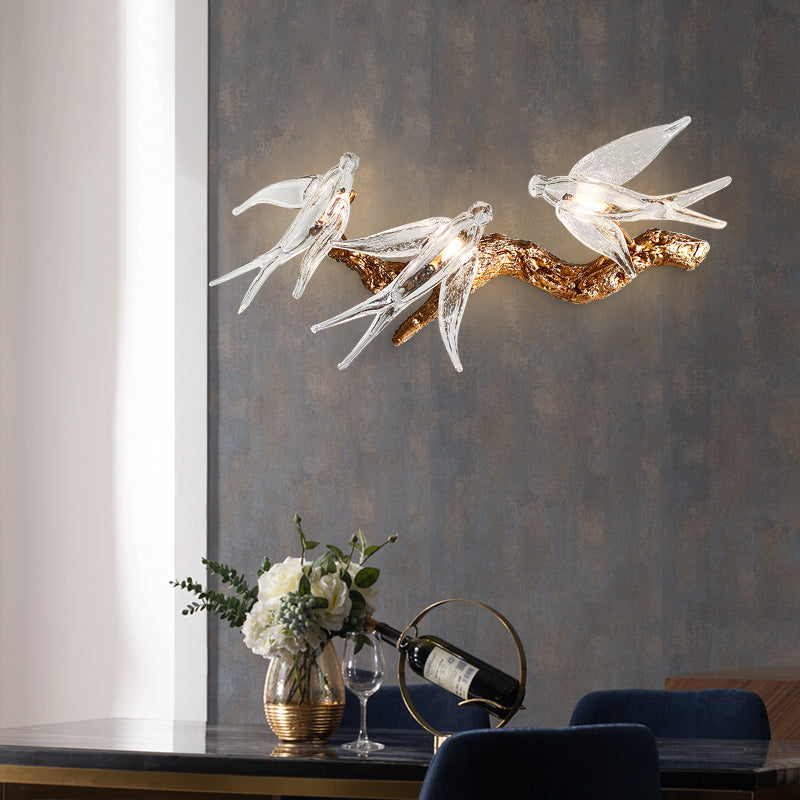 Side view of the copper wall sconce illuminating a stylish bedroom.