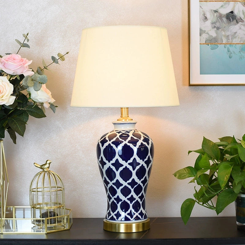 Ceramic lamp on a vintage side table emitting warm ambient light