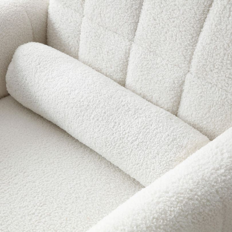 Detail shot of teddy fabric texture and biscuit tufting on armrest and back