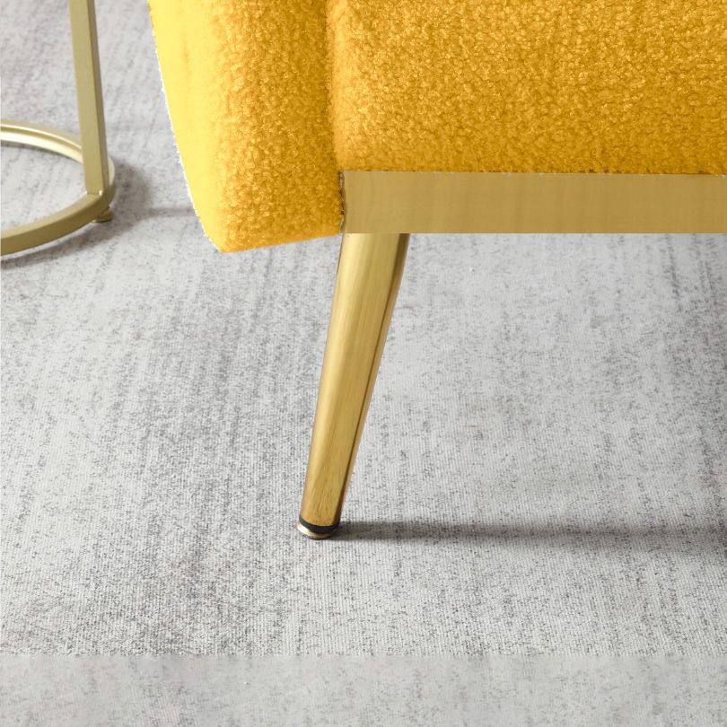 Chic yellow teddy fabric mid-century accent armchair from the side, highlighting its elegant design.
