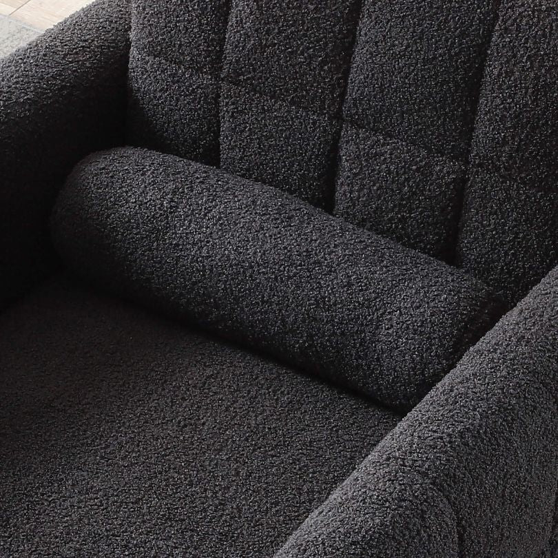 Close-up of the tufted design on the gray teddy fabric accent chair.
