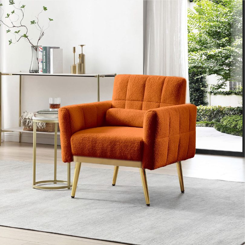 Modern tufted accent chair positioned in a stylish bedroom with bright decor.