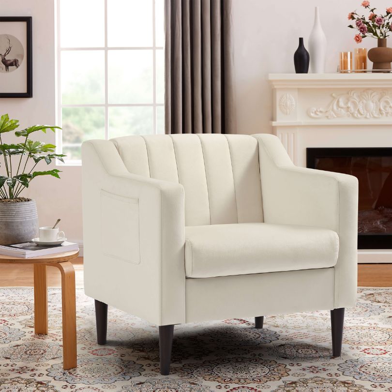 Elegant white tufted barrel accent chair showcasing sleek design from the side