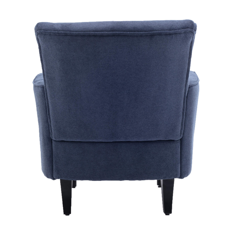 Close-up of the blue linen armchair highlighting the solid wooden legs and comfortable seat