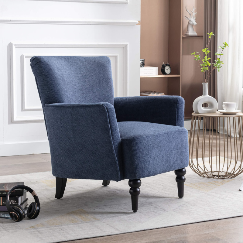 Elegant blue accent chair in a cozy living room setting, showcasing modern design