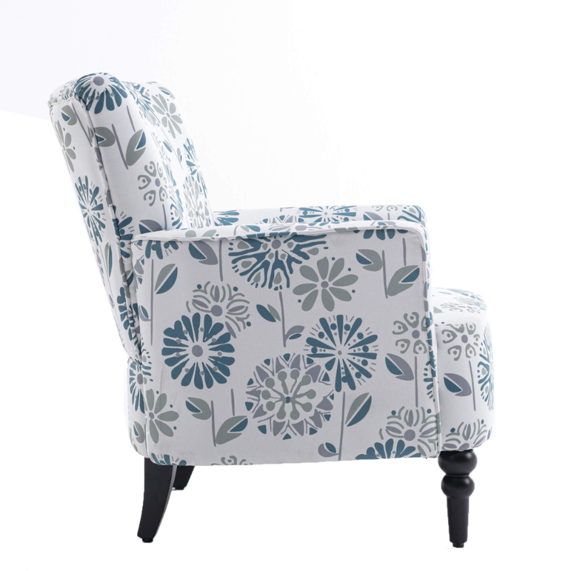 Charming blue floral linen vintage accent chair displayed in a cozy living room setting.