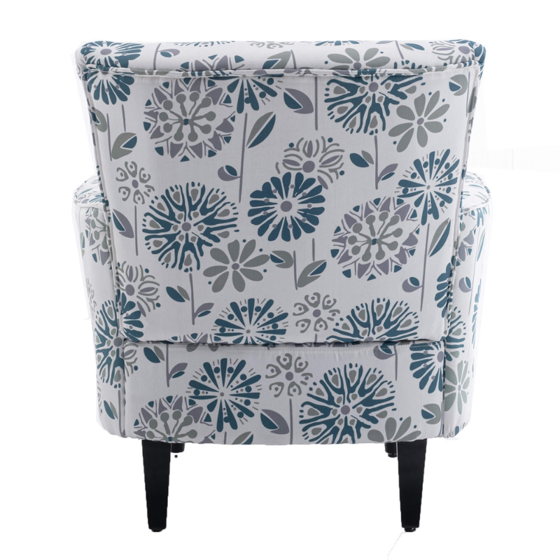 Close-up of the plush linen fabric on the vintage floral armchair, showcasing its quality.
