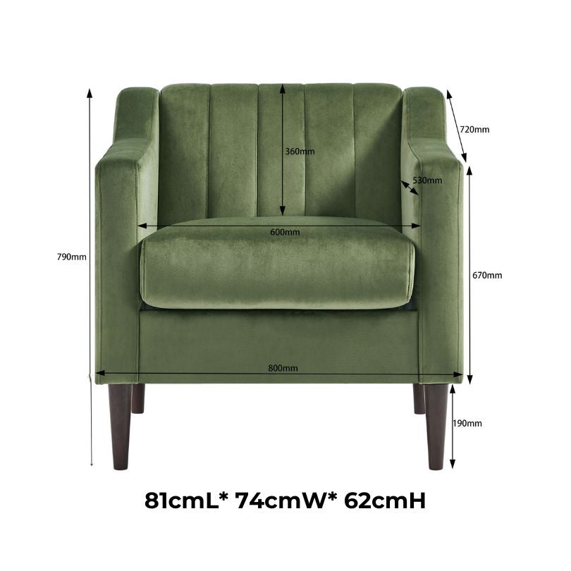 The green velvet accent chair showcasing its solid wood legs and ergonomic shape.