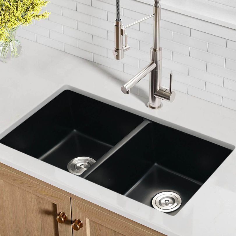 Premium Black Quartz Double-Bowl Undermount Kitchen Sink from above highlighting its smooth surface and deep bowls.