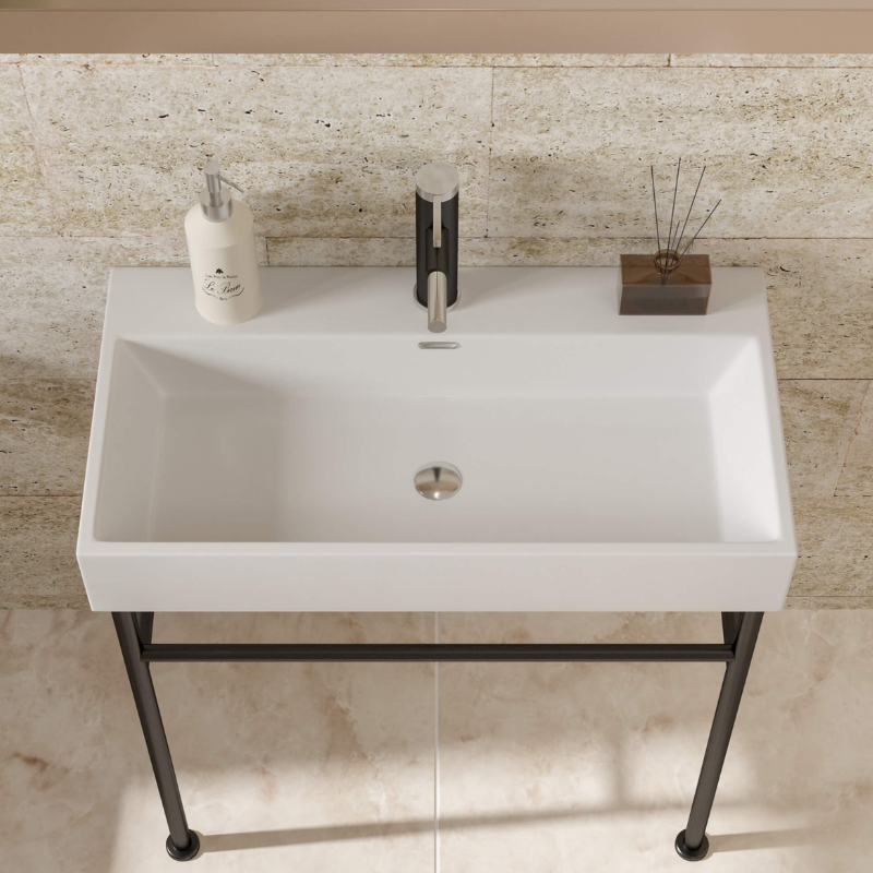 Installation view of the console sink in a contemporary bathroom setting, demonstrating its space-saving benefits.