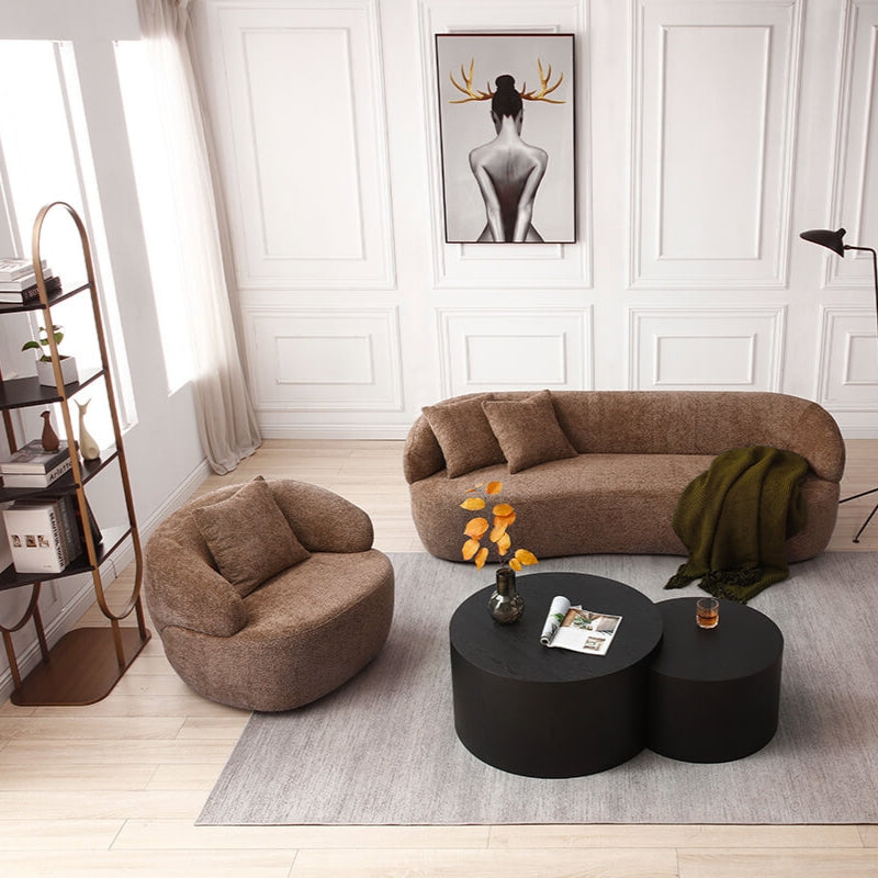 Elegant brown curved mid-century swivel sofa from the side, showcasing its gentle curves.