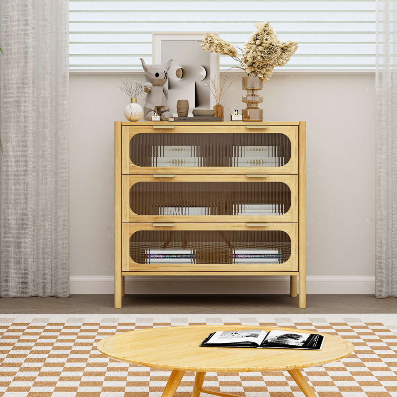 Elegant bamboo sideboard cabinet with three glass drawers from a side angle.