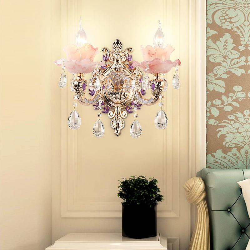 Elegant crystal wall sconce showcasing its gorgeous purple hue and unique design.