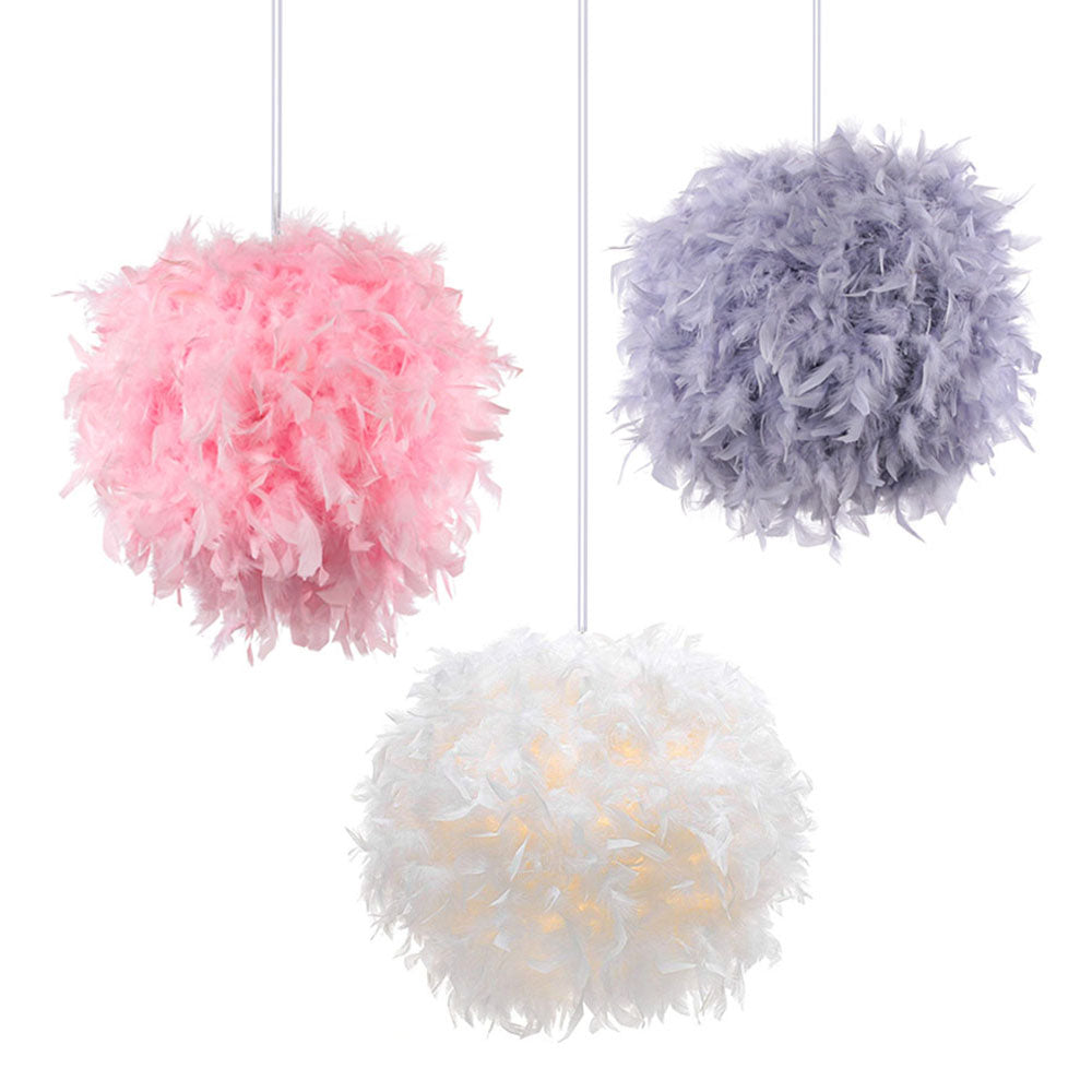 The Elegant LED Fairy Feather Pendant Light showcasing its soft glow in a cozy bedroom.