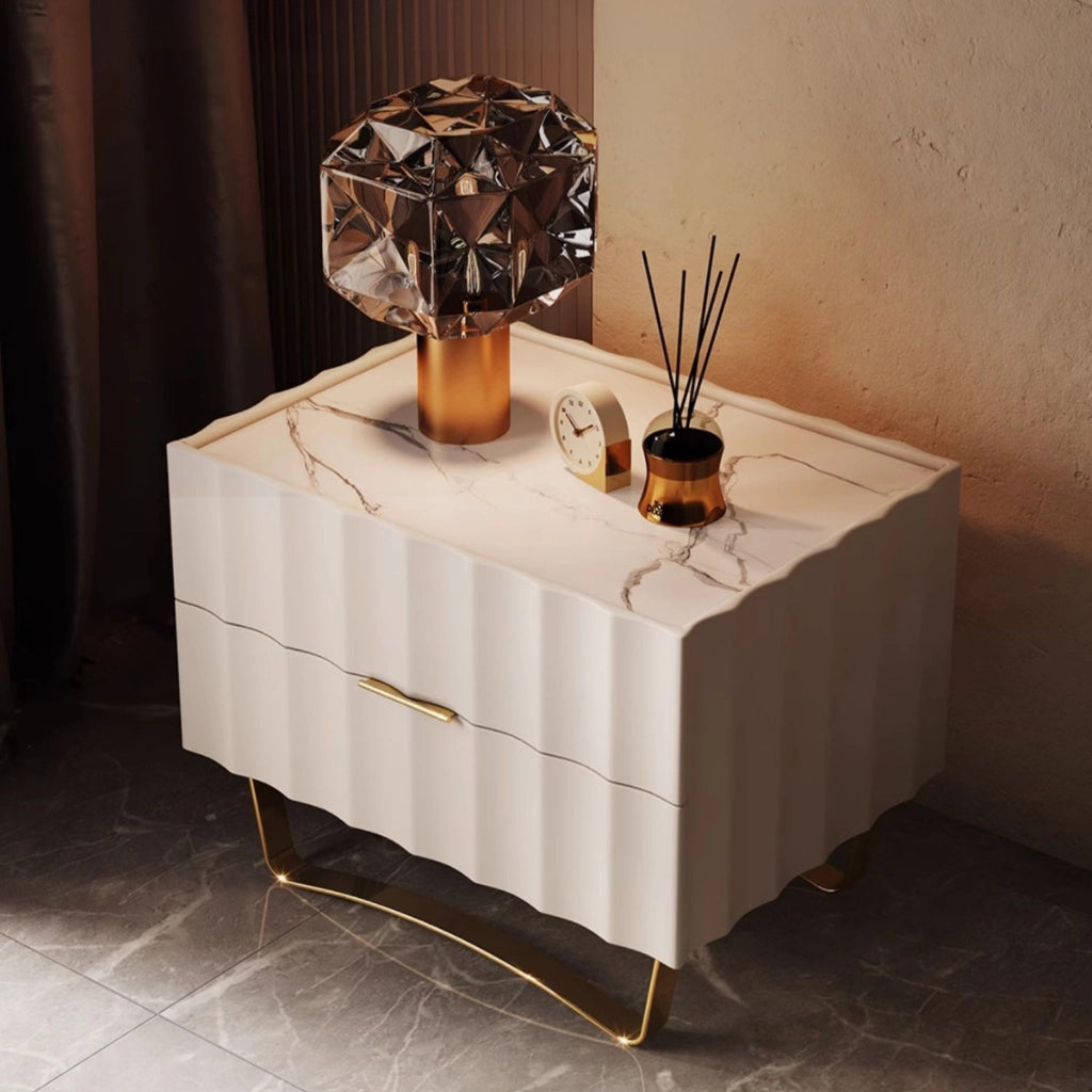 Side view highlighting the sleek stainless steel legs of the modern nightstand.