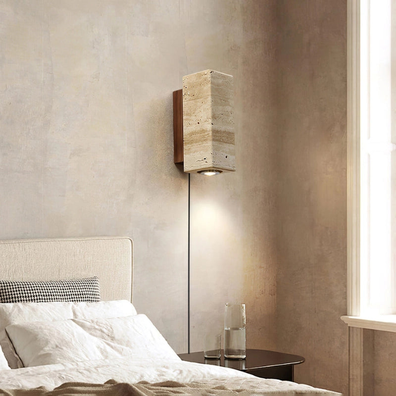 Side view of the waterproof wall sconce demonstrating its cylindrical design and solid wood base.