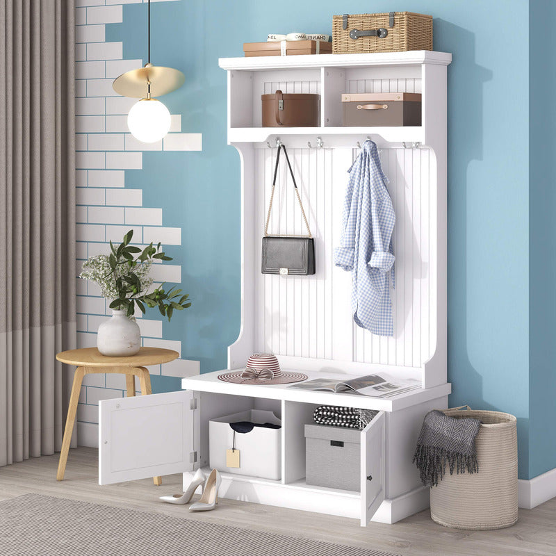 Close-up of the storage cabinet and hooks on the entryway bench, highlighting its practical organization features.