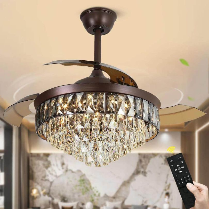 Luxury chandelier ceiling fan showcasing elegant crystals and brown finish from a side angle.