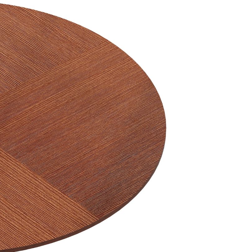 Cozy dining setup featuring the round oak dining table with stylish black pedestal base.
