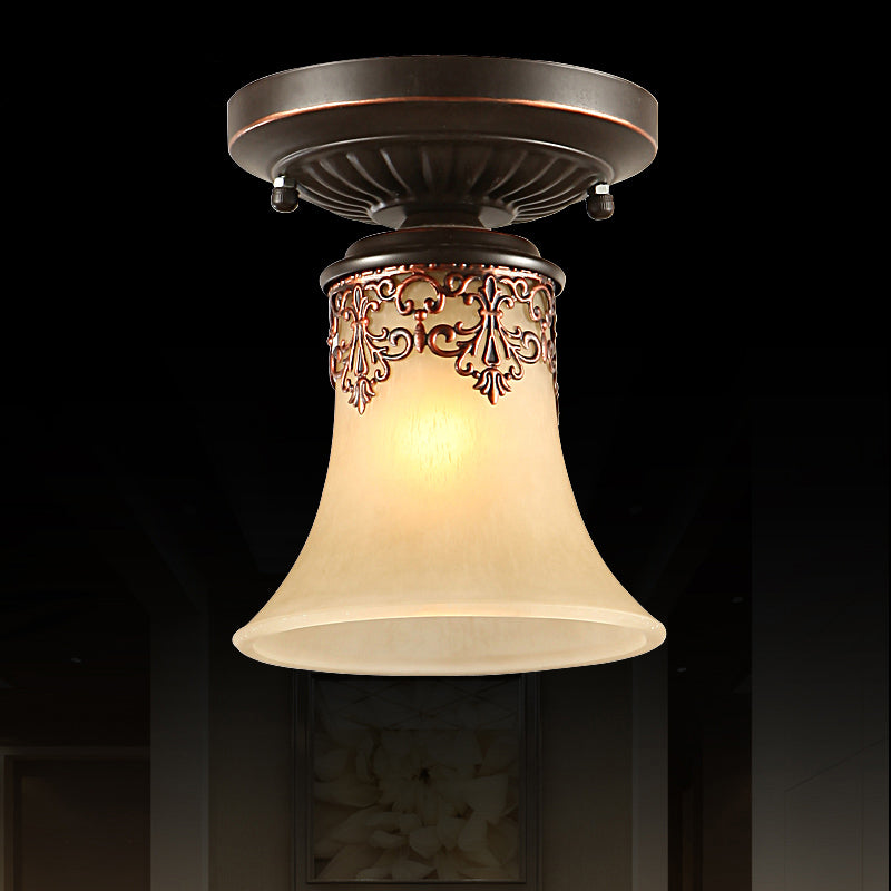 Close-up of vintage lighting with brushed nickel finish and E27 bulb