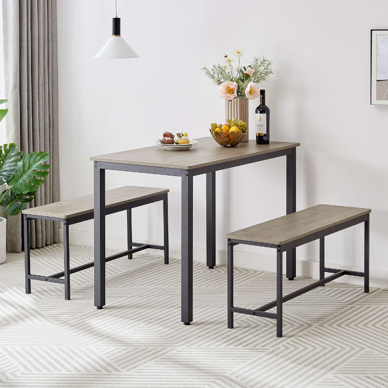 Front view of the compact industrial dining table set with two benches, showcasing its rustic charm.