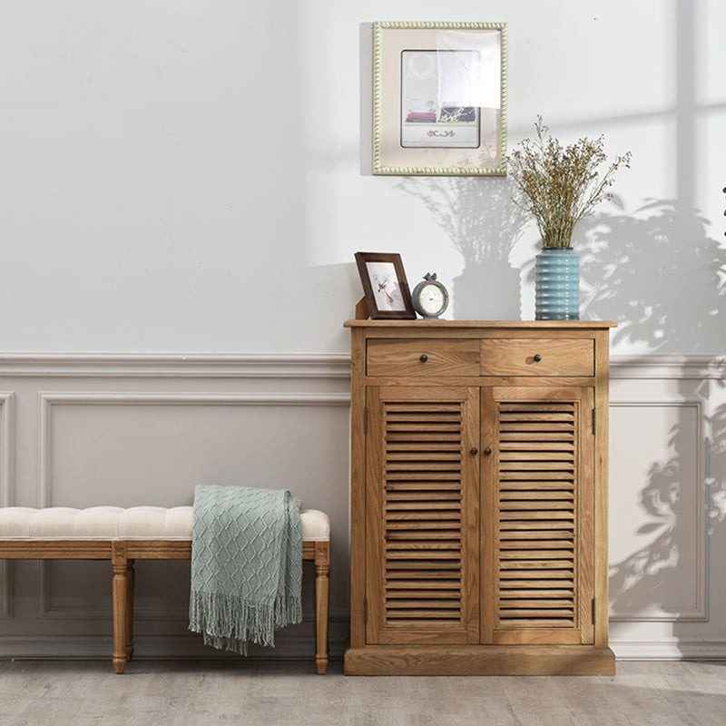 Retro solid wood shoe rack showing adjustable compartments and drawer.
